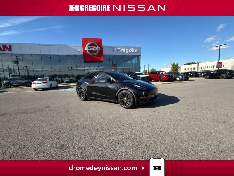 2022 Tesla Model Y Black Laval - photo #0