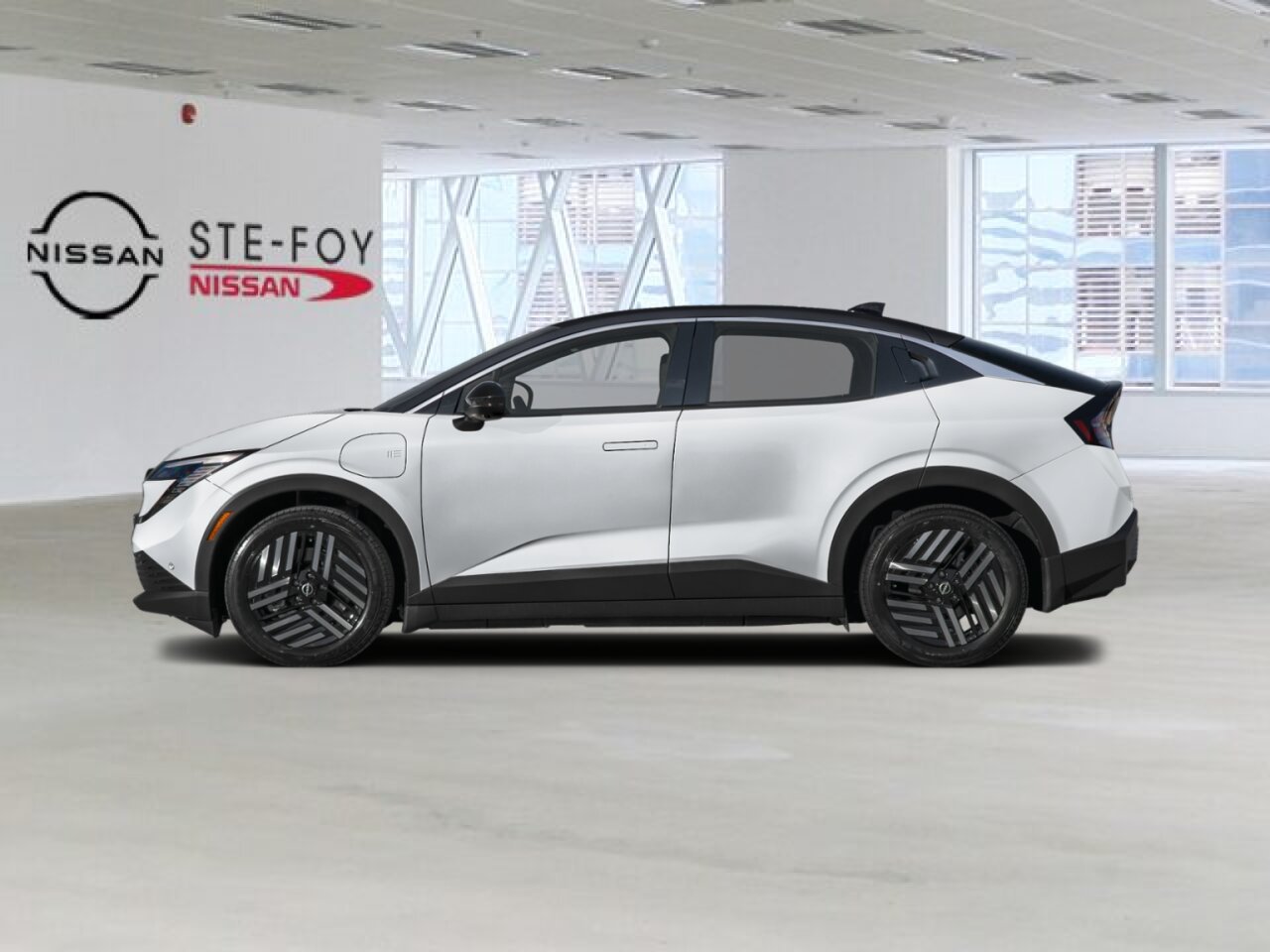 NISSAN LEAF 2026 Blanc Everest nacré triple couche/Noir Ste-Foy - photo #1