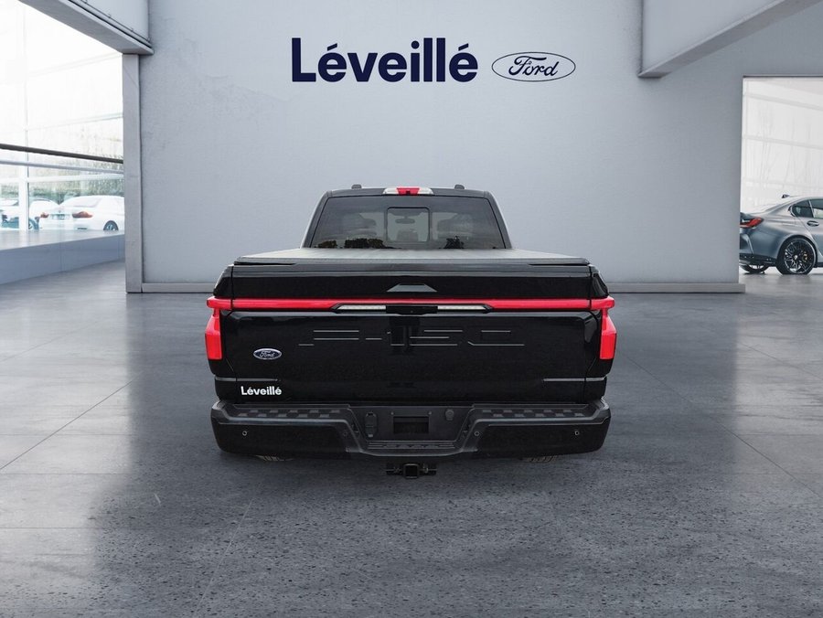 Ford F-150 Lightning Platinum ** GROSSE BATTERIE ** TOIT PANO ** 22P ** BAS KILO ** CARFAX CLEAN ** 5,5 pi 2023 Noir