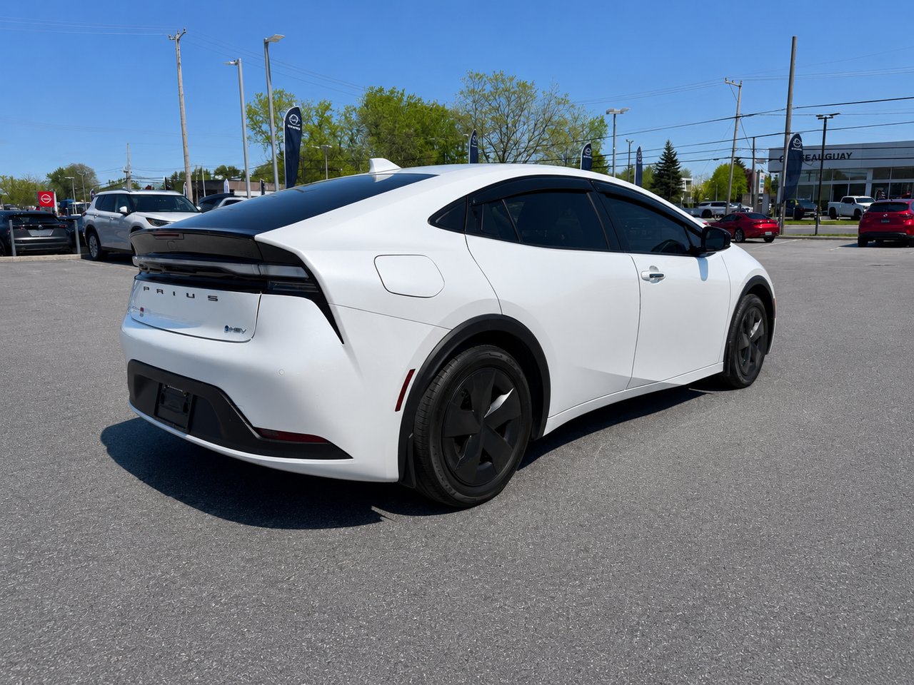 Toyota Prius hybride branchable JAMAIS ACCIDENTÉ / AUTONOMIE COMBINÉ DE PRES DE 980 KM 2025 Blanc Châteauguay - photo #4