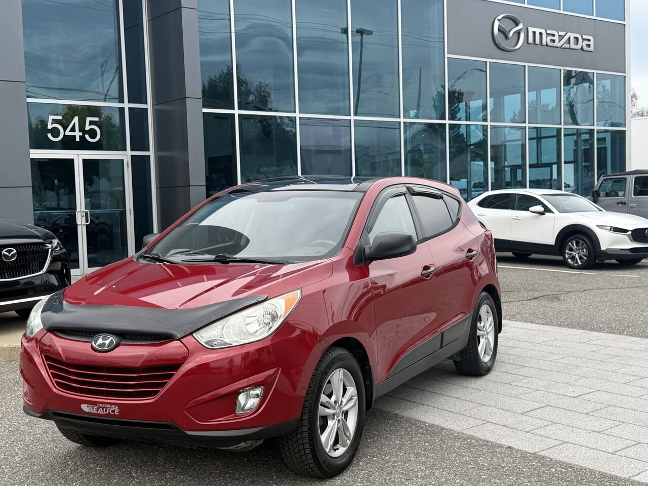2013 Hyundai Tucson Red Ste-Marie - photo #1