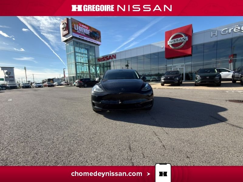 2022 Tesla Model Y Black Laval - photo #2