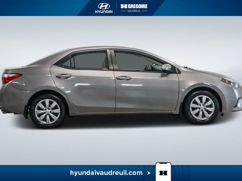 Toyota Corolla YA926 | 4dr Sdn CVT LE 2015 Beige Laval - photo #12