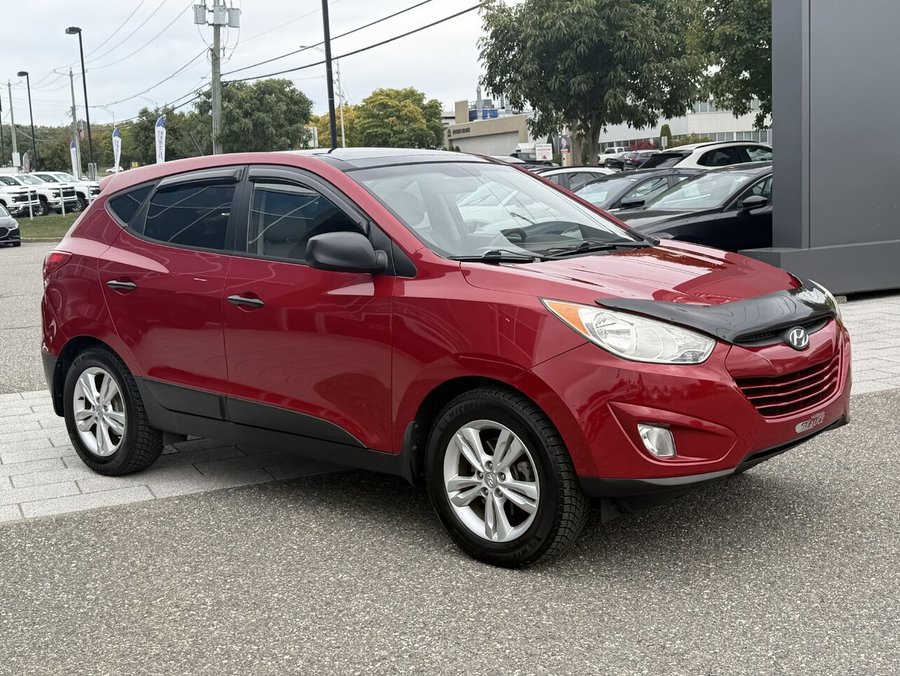 2013 Hyundai Tucson Premium Ed. TI 4p 4 cyl en ligne auto *Disp. lim.* Red