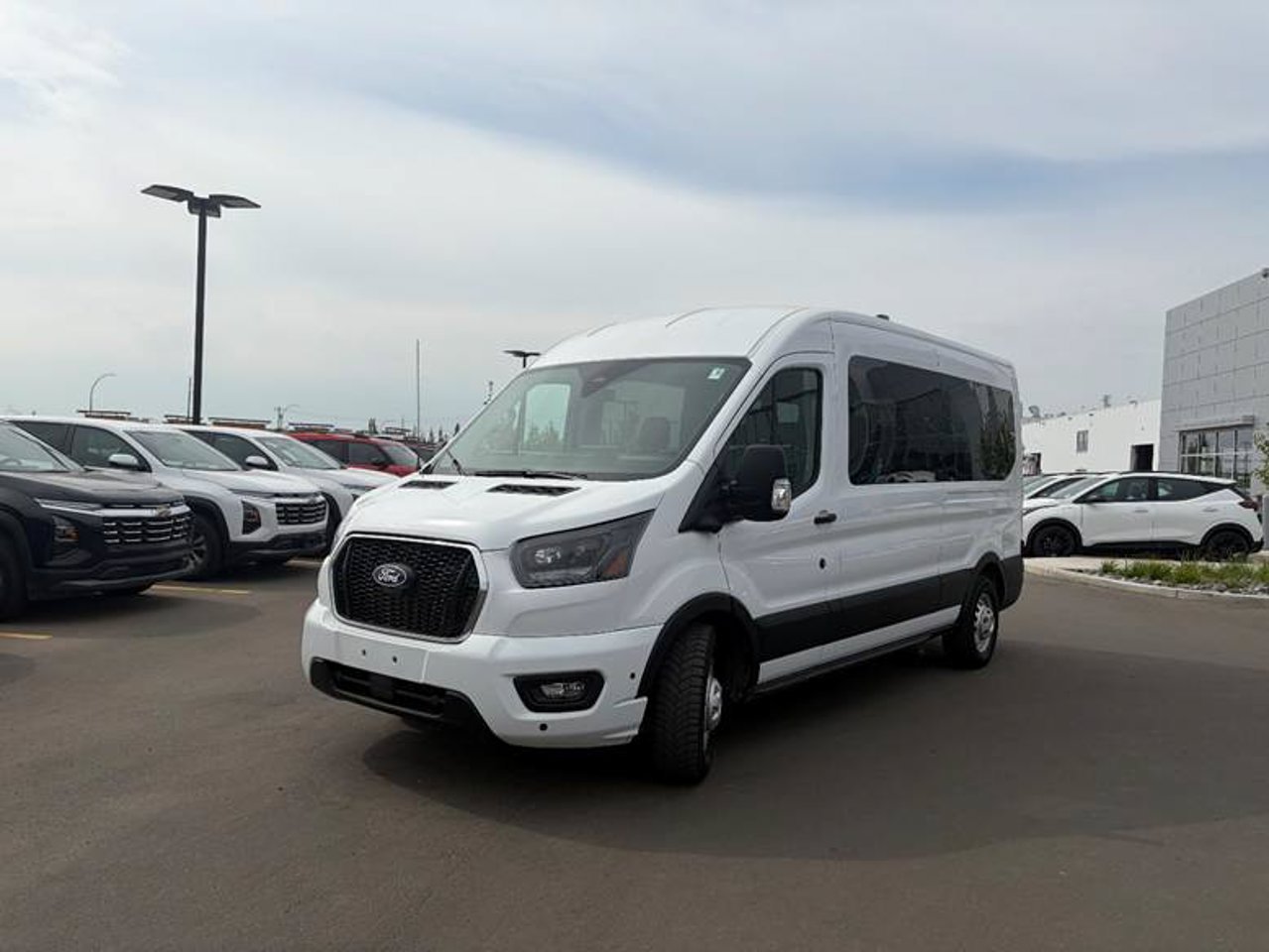 2026 Ford Transit Passenger Wagon T-350 148 Med Roof XLT AWD White Sherwood Park - photo #2