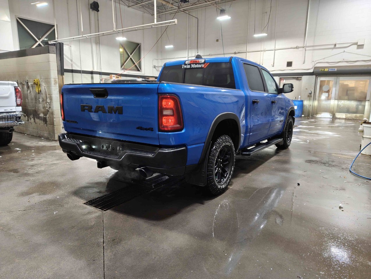2025 Ram 1500 Rebel 4x4 Crew Cab 5'7 Box Blue Sherwood Park - photo #5