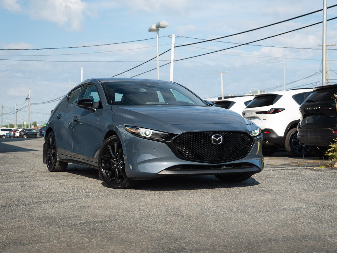 Mazda Mazda3 Sport U03102 | GT avec moteur turbo BA TI i-ACTIV 2023 Gris Val-d'Or - photo #0