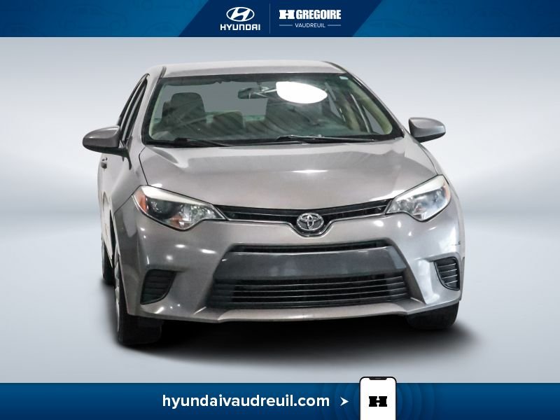 Toyota Corolla YA926 | 4dr Sdn CVT LE 2015 Beige Laval - photo #0
