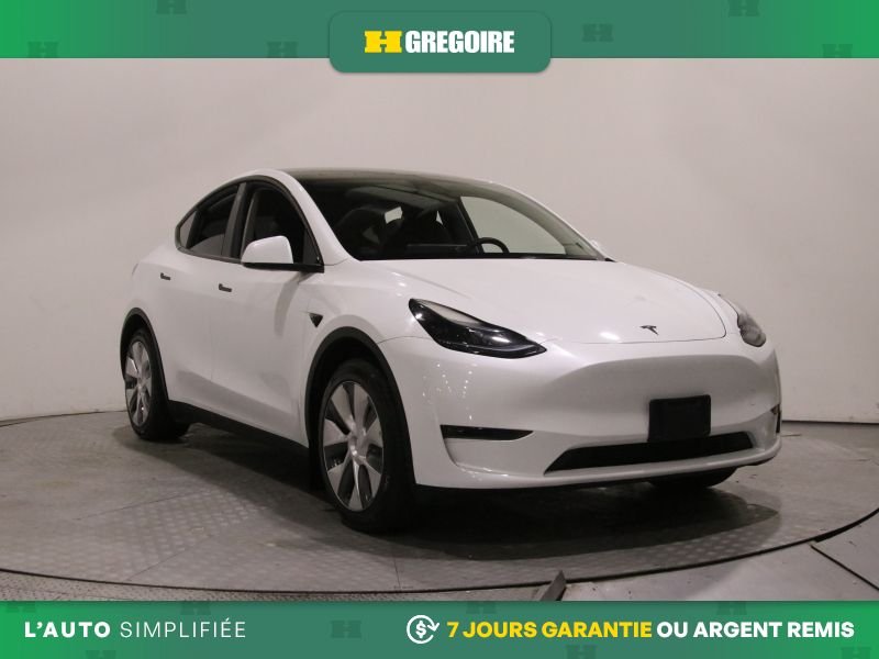 2023 Tesla Model Y White Saint-Léonard - photo #0