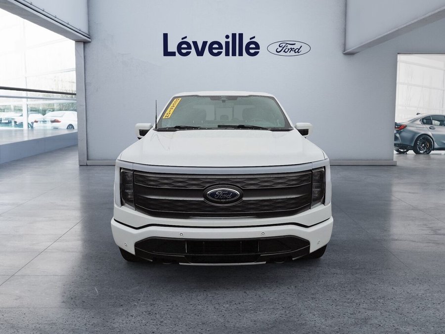 Ford F-150 Lightning LARIAT 511A ** GOSSE BATTERIE ** TOW MAX ** TOIT PANO ** CARFAX CLEAN ** 5,5 pi 2022 Blanc