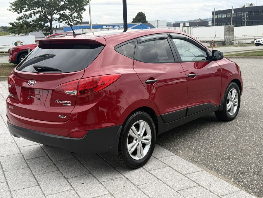 2013 Hyundai Tucson Premium Ed. TI 4p 4 cyl en ligne auto *Disp. lim.* Red