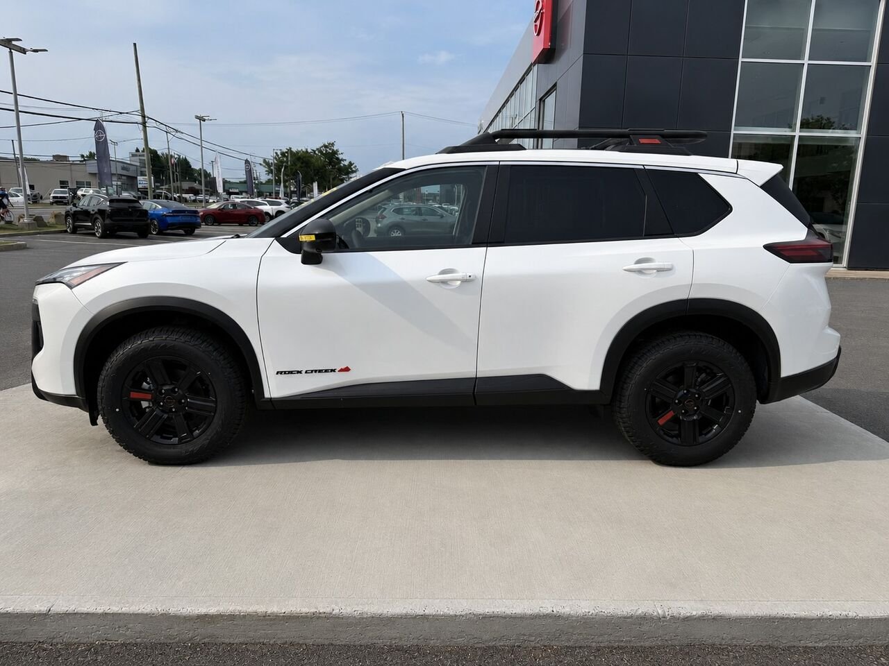 NISSAN Rogue ROGUE ROCK CREEK 2026 Blanc Everest nacré triple couche Châteauguay - photo #1