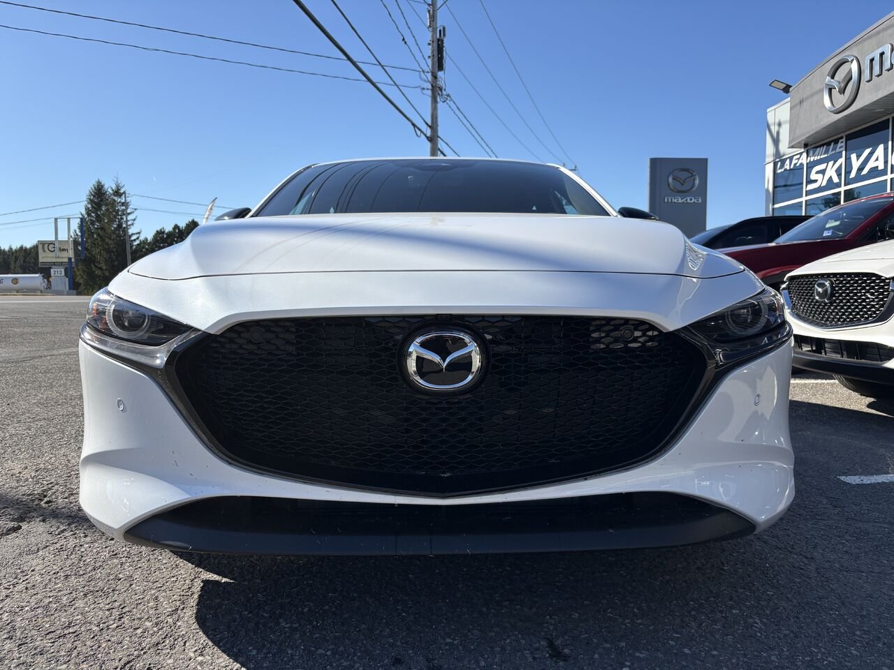 MAZDA Mazda3 Sport GT avec moteur turbo BA TI i-ACTIV 2026 Blanc neige nacré Montmagny - photo #1