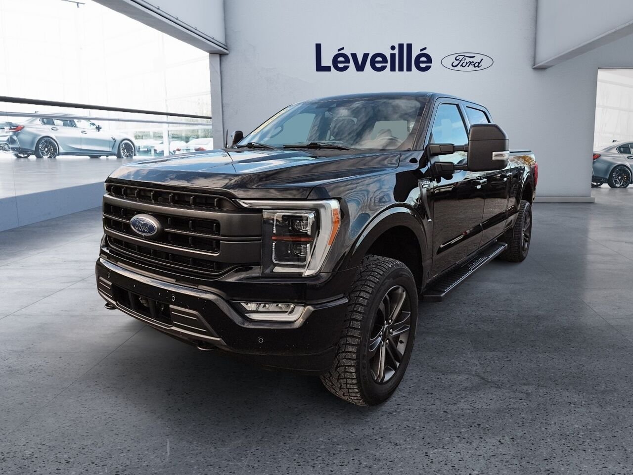 Ford F-150 W5560 | LARIAT 5.0L ** 502A ** SPORT ** TOIT PANO ** FX4 20P ** PRO POWER 2KW ** B&O ** 6,5 pi 2022 Noir Saint-Jérôme - photo #0