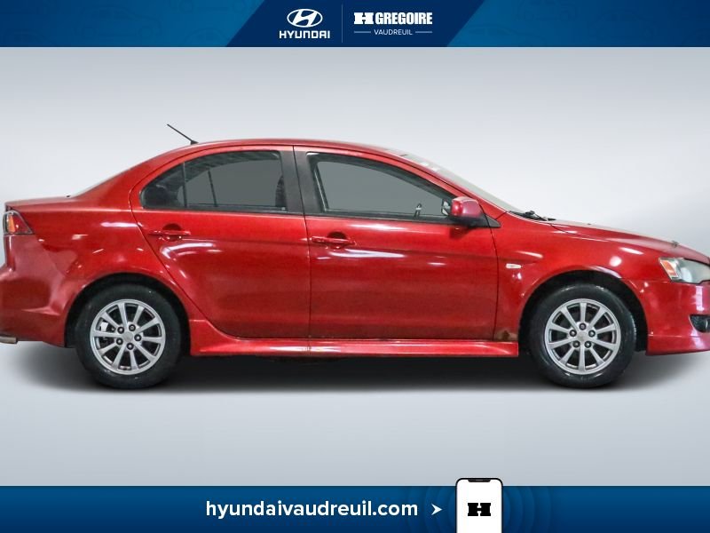 Mitsubishi Lancer YA898 | 4dr Sdn Man SE 2010 Rouge Laval - photo #12