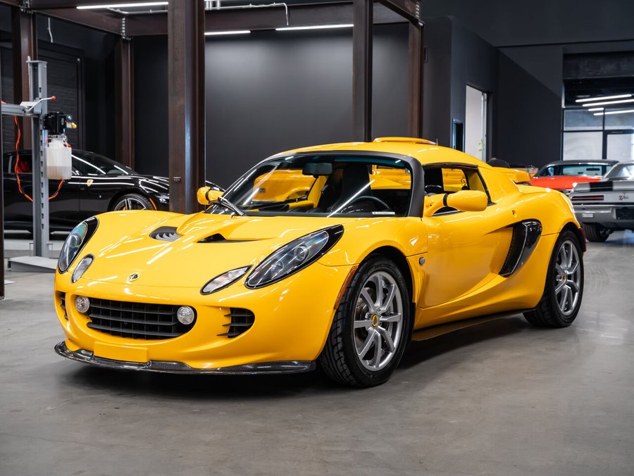 2006 Lotus Elise | Carbon Body Kit | Hard Top & Soft Top | Blaupunkt Sound System | PPF | One Owner Yellow