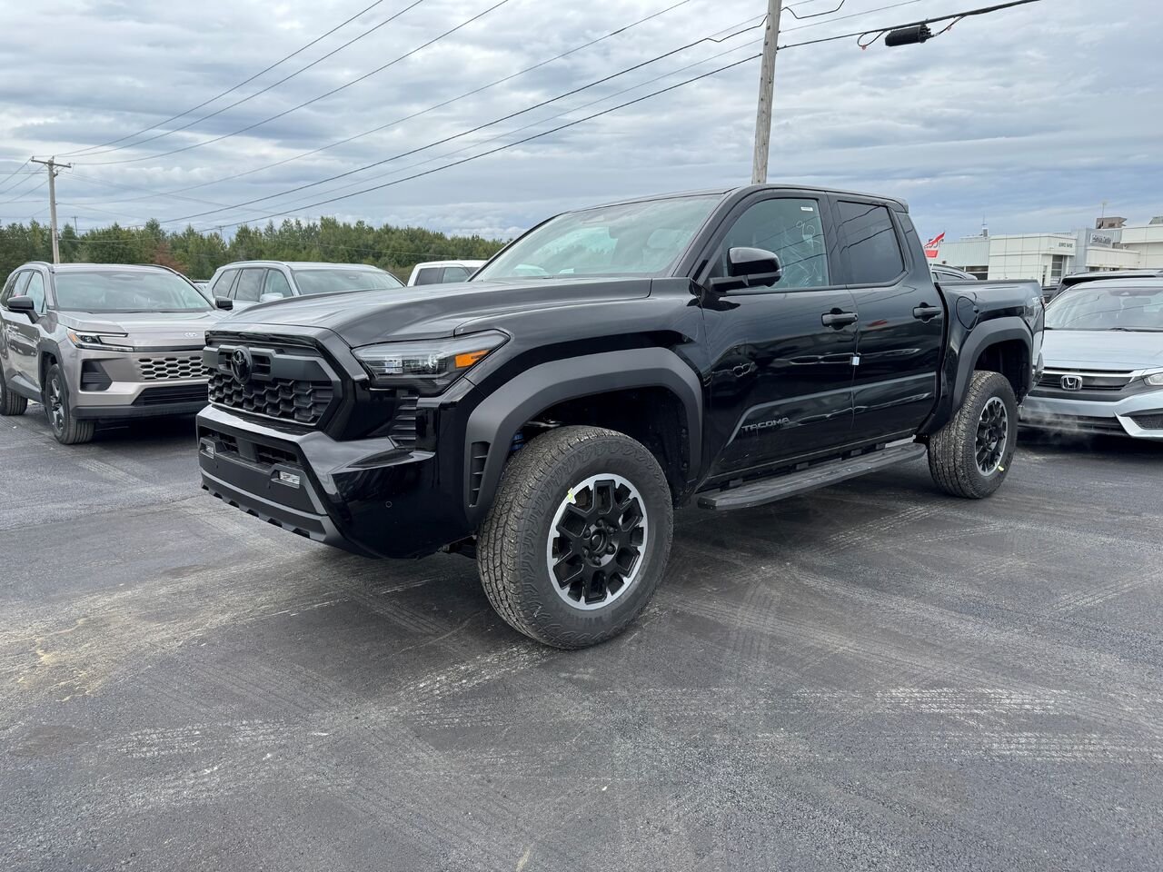 Toyota Tacoma Double Cab 4x4 BA emp. court 2026 Noir Val-d'Or - photo #0