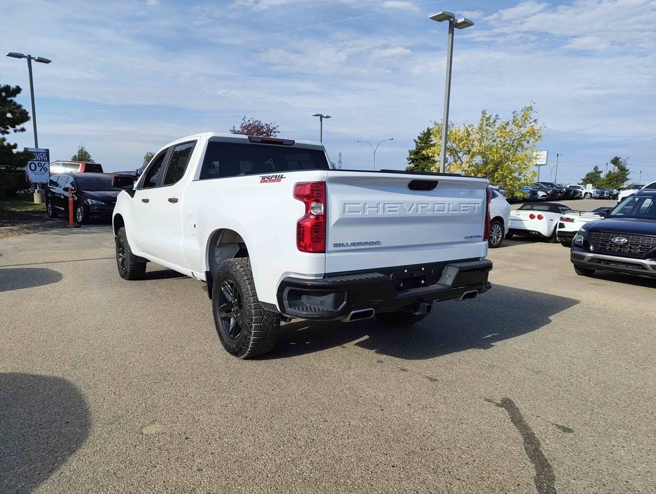 2025 Chevrolet Silverado 1500 4WD Crew Cab 157 Custom Trail Boss White Sherwood Park - photo #4