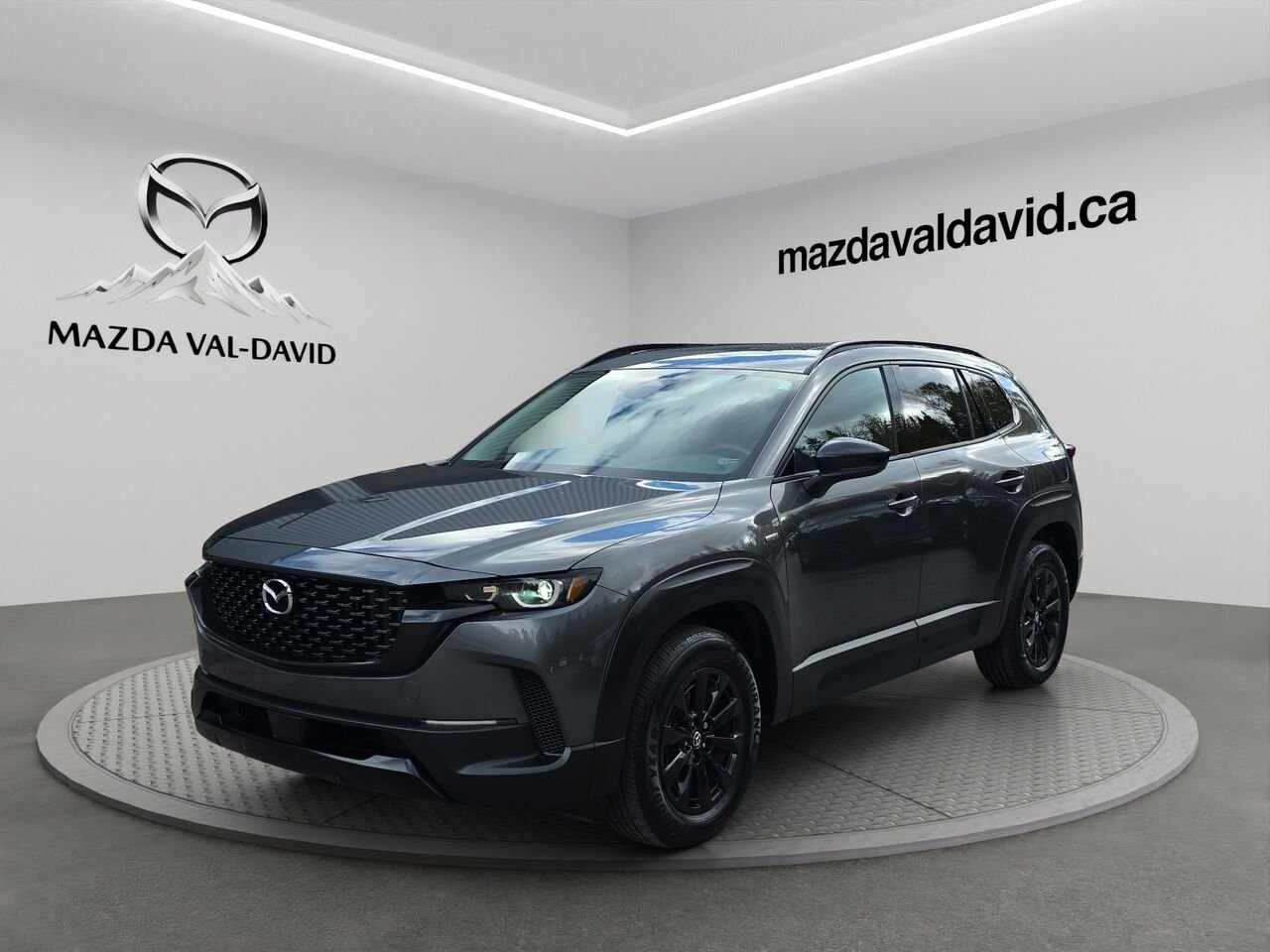 2025 Mazda CX-50 hybride GS-L e-AWD, toit panoramique, sièges avant chauffants, volant chauffant, Apple CarPlay/Android Grey Val-David - photo #0