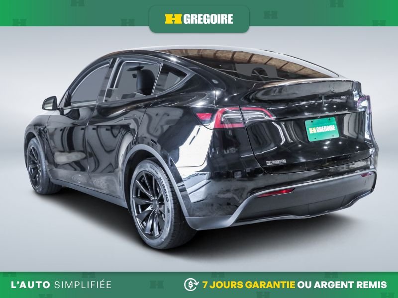 2023 Tesla Model Y Black Laval - photo #5