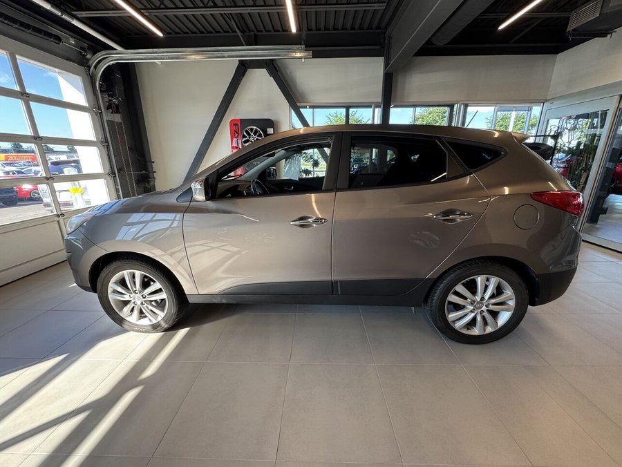 Hyundai Tucson Limited Awd, Toit ouvrant, Siège électrique 2011 Gris
