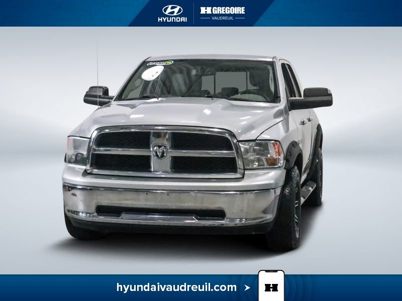 2012 Dodge Ram 4WD Quad Cab 140.5" SLT Silver
