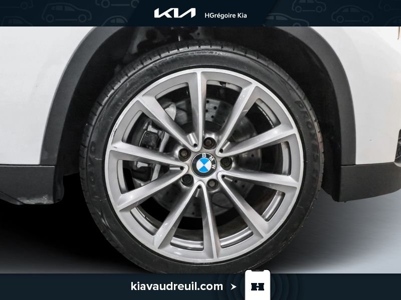 BMW X1 2014 Blanc Laval - photo #23