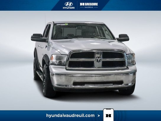 2012 Dodge Ram 4WD Quad Cab 140.5" SLT Silver