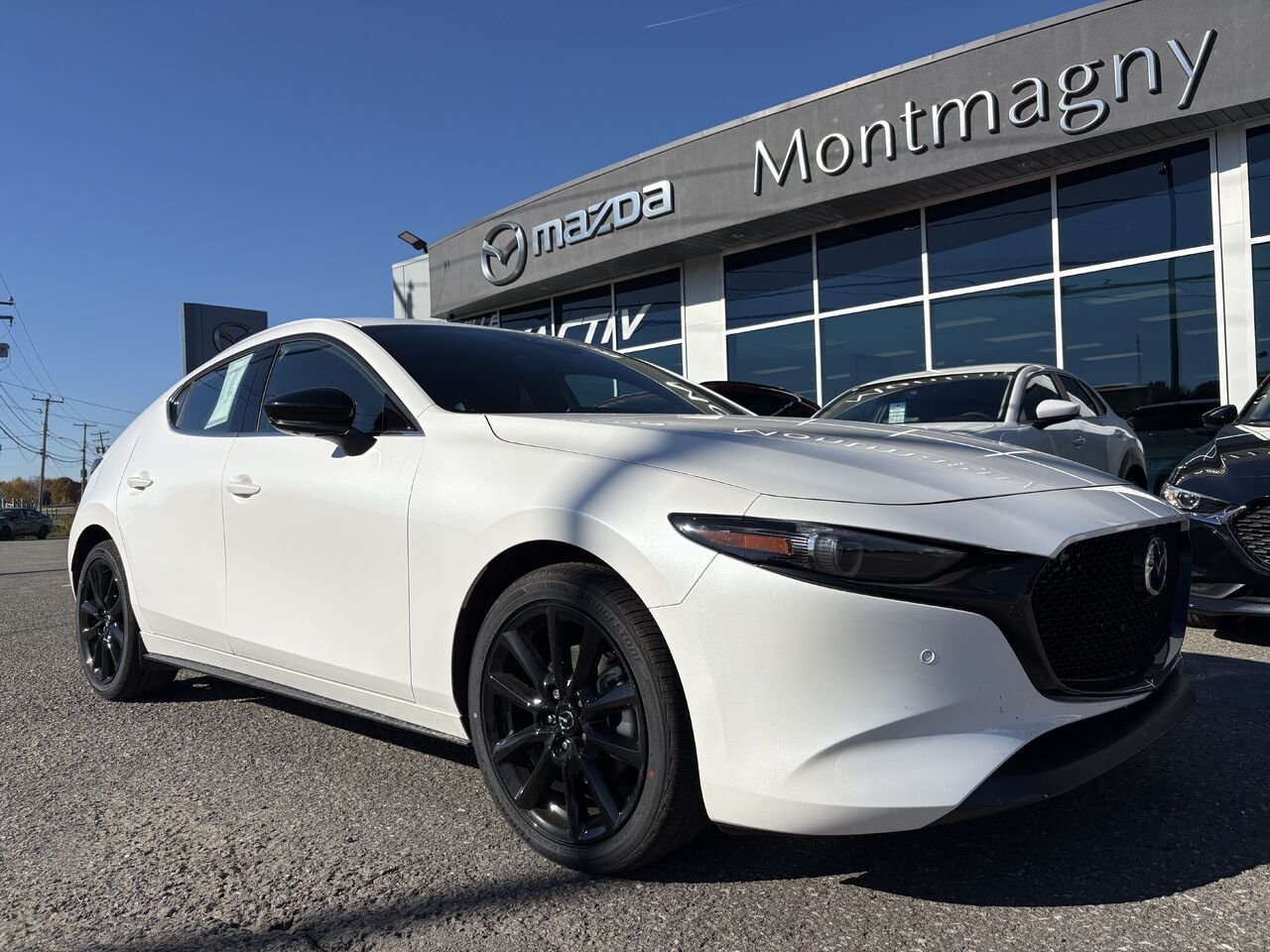 MAZDA Mazda3 Sport GT avec moteur turbo BA TI i-ACTIV 2026 Blanc neige nacré Montmagny - photo #0