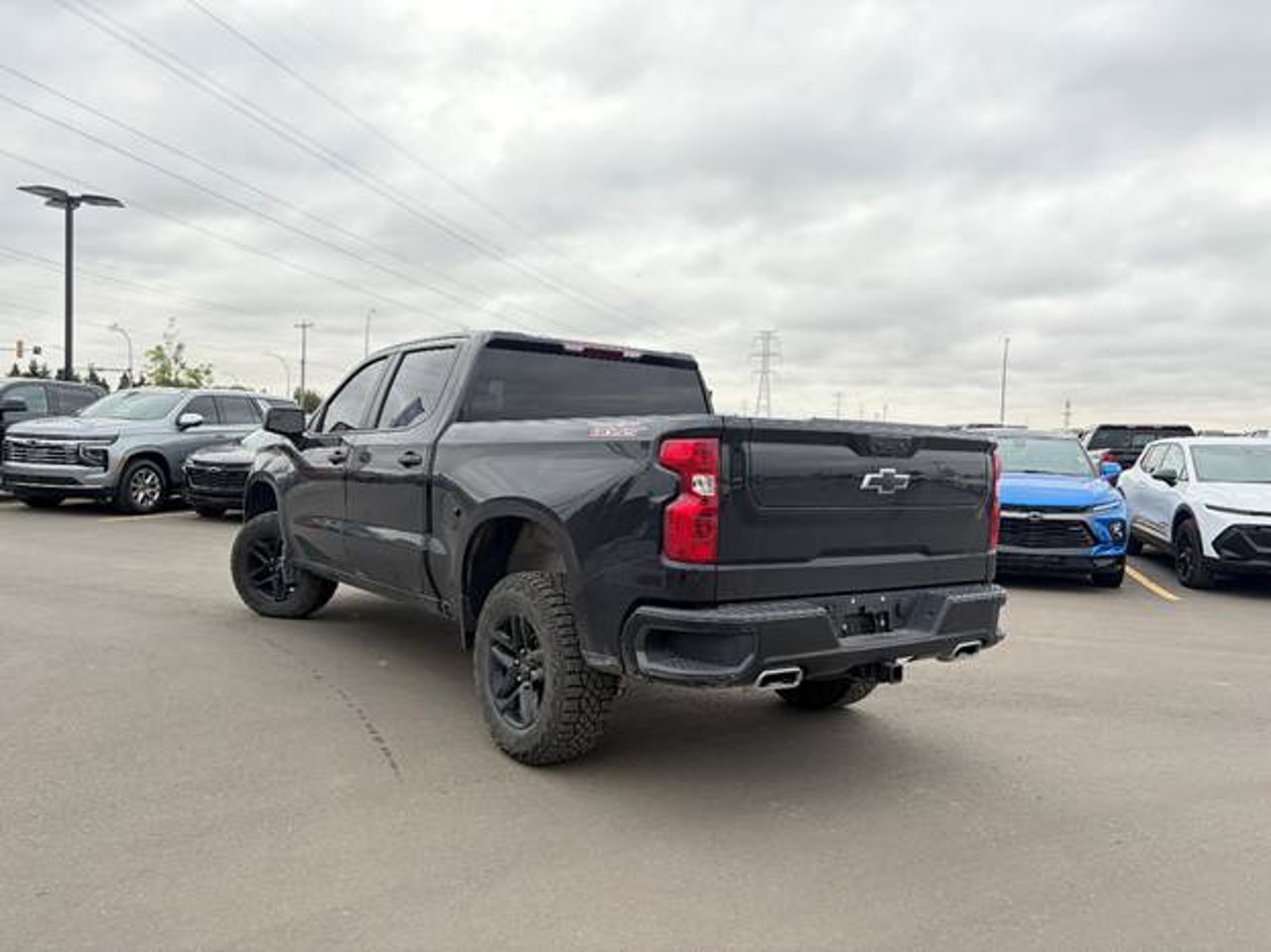 2024 Chevrolet Silverado 1500 4WD Crew Cab 147 Custom Trail Boss Black Sherwood Park - photo #2