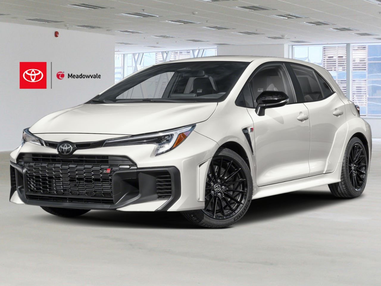 2026 Toyota GR Corolla Premium Package Adds upgrades like a forged carbon-fiber roof, a prominent hood bulge with functional vents, a sub-radiator for enhanced track cooling, and a head-up display White Mississauga - photo #0