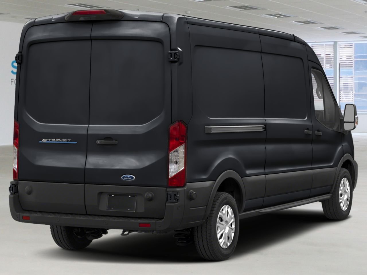 Ford E-Transit fourgonnette utilitaire T-350 PA TOIT MOYEN 148 PO PNBV DE 9 500 LB 2025 Noir agate métallisé Châteauguay - photo #1