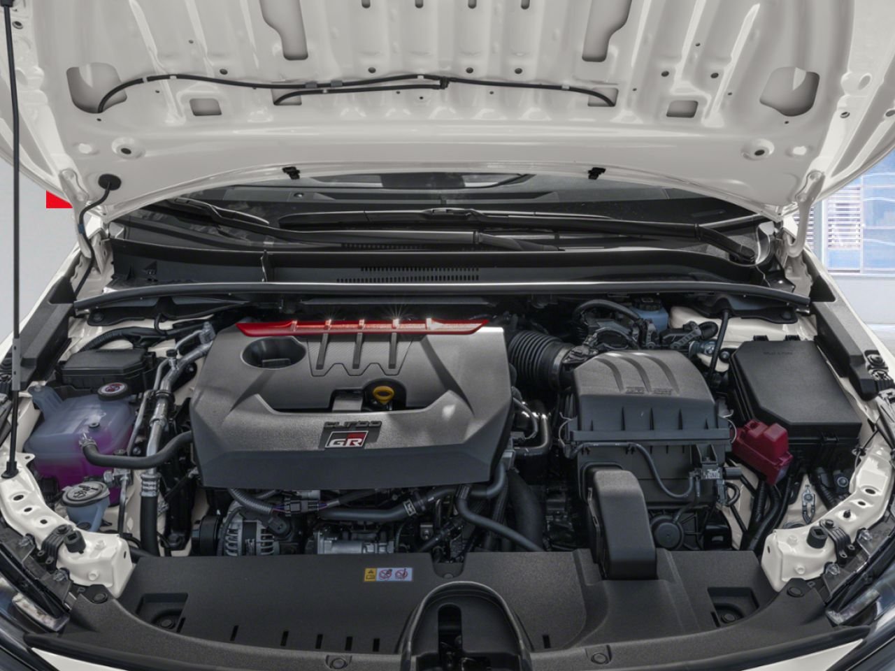 2026 Toyota GR Corolla Premium Package Adds upgrades like a forged carbon-fiber roof, a prominent hood bulge with functional vents, a sub-radiator for enhanced track cooling, and a head-up display White Mississauga - photo #7