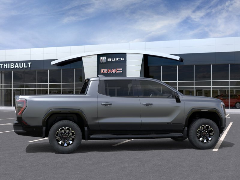 GMC Sierra EV AT4 cabine multiplace 4RMe à autonomie maximale 2026 Gris Magnus mat