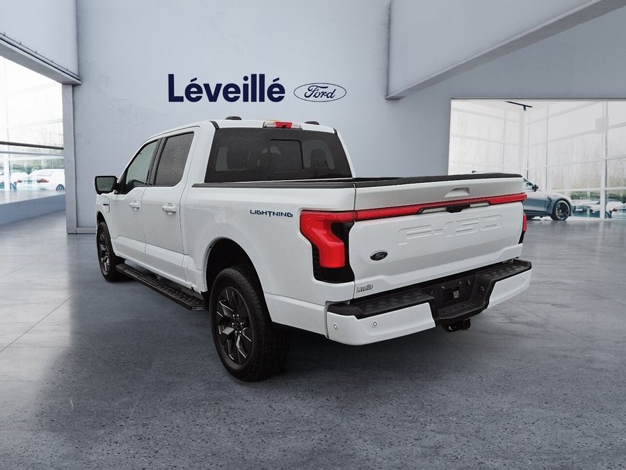 Ford F-150 Lightning LARIAT 511A ** GOSSE BATTERIE ** TOW MAX ** TOIT PANO ** CARFAX CLEAN ** 5,5 pi 2022 Blanc