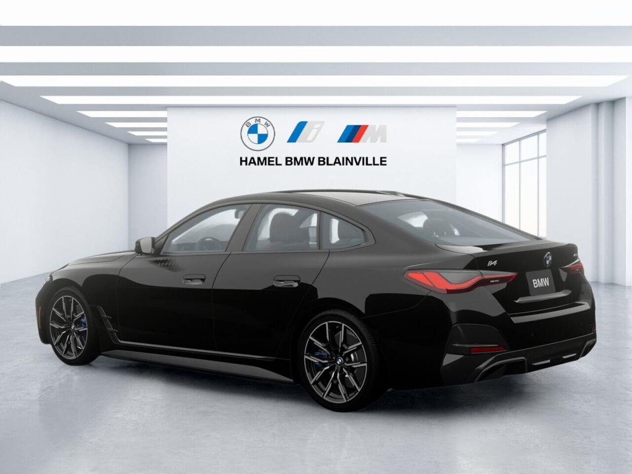 2026 BMW i4 eDrive40 Black Sapphire Metallic Blainville - photo #1