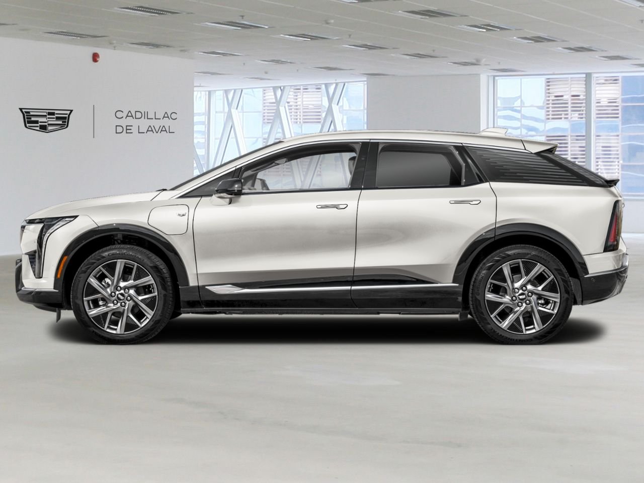 CADILLAC OPTIQ OPTIQ ELECTRIC SPORT AWD (1SF) 2027 Blanc éclatant, triple couche Laval - photo #1